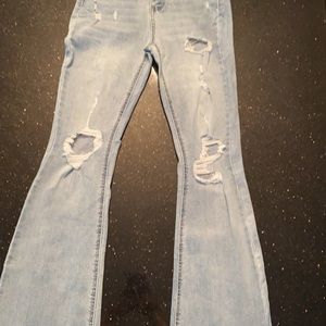 Indigo Rein Lt wash , High Rise Flare leg Jeans Junior size 5. New w/ Tags